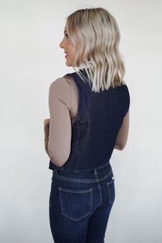 Denim vest that will be a staple layering tool in your closet this season! Natalie is wearing a size S. Fits true to size. Short Jean Skirt, Cc Beanie, Shoe Gifts, Denim Flares, Western Dresses, Jean Skirt, Denim Vest, Sweater Top, Jumpsuit Romper