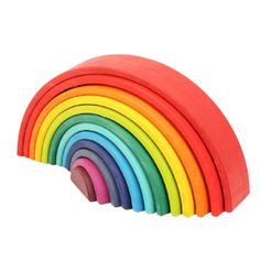 a rainbow shaped wooden toy on a white background