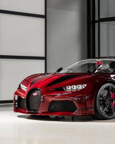 a red sports car parked in front of a building