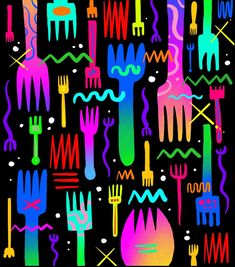 colorful forks and spoons on a black background