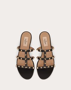 Rockstud Flat Slide Sandal for Woman in Poudre Designer Calf Leather Sandals With Studded Outsoles, Designer Studded Flat Sandals, Leather Sandals With Gold Studs And Round Toe, Designer Studded Flats, Designer Flat Sandals With Studded Rubber Outsoles, Designer Flat Sandals With Studded Outsoles, Valentino Slides, Valentino Flats, Rockstud Flats