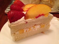 a piece of cake with fruit on top