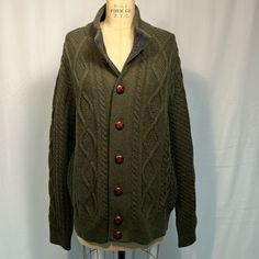 Barbour Cable Knit Olive Green Sweater Size Large Excellent Condition Leather Buttons Lamb’s Wool Merino Wool Cable Knit Outerwear For Layering, Cable Knit Merino Wool Outerwear For Layering, Casual Merino Wool Sweater With Buttons, Green Cable Knit Sweater Coat, Wool Cable Knit Outerwear For Layering, Wool Cable Knit Cardigan For Layering, Wool Cable Knit Polo Sweater For Fall, Green Merino Wool Long Sleeve Outerwear, Green Wool Cable Knit Sweater