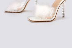 Product Title :Fluffy Stiletto Slide SandalsProduct Measurements cm Size Heel Height 35 11 36 11 37 11 38 11 39 11 40 11 41 11 42 11 35 4.3 36 4.3 37 4.3 38 4.3 39 4.3 40 4.3 41 4.3 42 4.3 Product Details Material: 100% PVC Color: Blue Elegant Synthetic Heels For Winter, Trendy Round Toe Heels For Wedding, Trendy Round Toe Wedding Heels, Trendy Wedding Heels With Round Toe, Winter Open Toe Heels With Padded Heel, Winter Formal Open Toe Heels, Glamorous Open Toe Heels For Winter, Elegant Open Toe Heels For Winter, Winter Evening Open Toe Heels