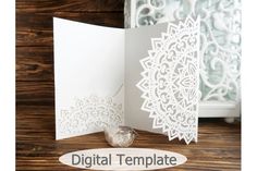 an open card with white paper cut out on it