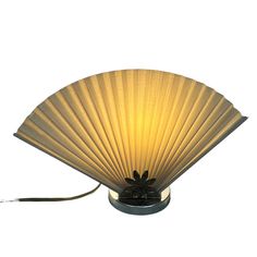 a lamp that is shaped like a fan