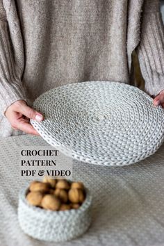 a woman is holding a bowl with nuts in it and the text reads crochet pattern pdd & video