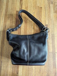 Vintage Coach Hobo Bag Black Silver Buckles and Grommets Oval Bottom Adjustable Strap Over the Shoulder Excellent Condition Coach Black Hobo Bag Vintage, Coach Hobo Bag, Coach Hobo, Dream Bags, Slouchy Bag, Vintage Coach Bags, Vintage Bag, Coach Bag, Vintage Coach