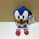 sonic the hedge plush toy sitting on top of a table