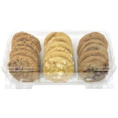 four cookies in a plastic container on a white background