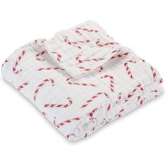 Candy Cane Prints Baby Muslin Quilt by LollyBanks  a delightful blend of comfort and style for your little one. Crafted from 100% cotton muslin, this quilt boasts a generous 47" x 47" size, providing the perfect snuggle companion for your baby. With six layers of breathable and lightweight fabric, it ensures optimal comfort, making it ideal for year-round use. The candy cane prints add a festive touch to your baby's nursery, while the fade-resistant material and machine-washable design make it a Candy Cane Quilt, Muslin Quilt, Holiday Blankets, Toddler Quilt, Man Quilt, Christmas Baskets, Lightweight Blanket, Muslin Baby