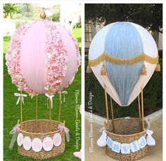 two hot air balloons with pink and blue decorations