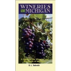 the book cover for wineries of michigan by d l balekh, with grapes growing on it