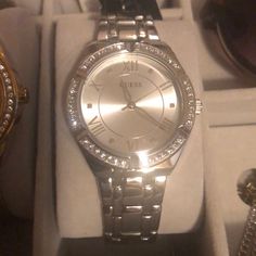 Brand New Guess Silver Watch. With Patterned Rhinestones Around The Frame. Guess Watches Women Silver, Elegant Metal Watches With Bling, Elegant Embellished Metal Watches, Elegant Metal Watch With Rhinestones, Elegant Metal Watches With Rhinestones, Formal Metal Watches With Bling, Formal Stainless Steel Watches With Rhinestones, Guess Watches Women, Guess Aesthetic