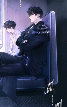 two people sitting on a train looking out the window, one is wearing a black coat