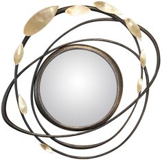 a round mirror sitting on top of a metal frame