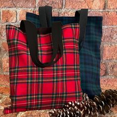 Red Tartan plaid bag, Black Watch tartan (green tartan plaid) Scottish Tartan plaid  shoulder bag   Plenty of room to hold lots of stuff.  Fully lined. This Classy bag is smart and making it a true go-anywhere, carry-everything bag. Good for Holiday gift too. Size  Dimensions : Width: 13 inches(33 cm)  Hight 14" (35.5cm) Height:  Handle Strap Length: 20.5 inches (52cm), Strap width 1" (2.5cm) Handle strap drop 10" (25.5cm) [faric] Brushed Cotton Flannel Red Tartan plaid 100% cotton full lined with durable black canvas We have other bags made from the Wool Plaid fabric in this shop, you can find them here:  https://www.etsy.com/shop/SewEasyNewYork?ref=l2-shopheader-name&section_id=19618681 Care : Spot clean or Dry clean   This bag is Made to order item. Each bag is made from different parts Plaid Rectangular Bag For School, Rectangular Plaid Bags For School, Rectangular Plaid Bag For School, Rectangular Plaid School Bag, Plaid Rectangular Shoulder Bag For School, Black Watch Plaid, Plaid Bag, Royal Stewart Tartan, Black Watch Tartan