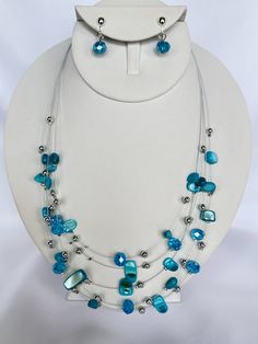 Elevate your style with our unique clip-on silver, turquoise and blue odd shape bead necklace! Made with high-quality silver wire, this necklace set is perfect for any occasion. Add a touch of elegance to any outfit and stand out from the crowd. Necklace 18" Ext 3" Hangs 2 1/2" in the front Earrings 1 1/4" Bead Wire, Easy Jewelry, Wire Necklace, Weird Shapes, Necklace And Earring Set, Necklace Long, Silver Turquoise, Bead Necklace, Silver Wire