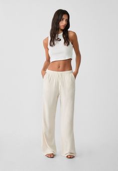 Loose-fitting linen blend trousers - Women's fashion | Stradivarius United States Viscose Wide-leg Pants With Elastic Waistband, Chic High-waisted Viscose Pants, Chic Linen Bottoms For Loungewear, Chic Linen Loungewear Bottoms, Chic Cotton Sweatpants, Relaxed Ankle-length Work Pants, Chic Linen Straight Pants, Chic Straight Linen Pants, Viscose Pants With Elastic Waistband