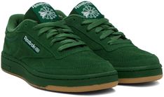 Low-top suede sneakers in green. · Perforated detailing at toe · Lace-up closure · Logo flag at padded tongue · Padded collar · Inset logo patch at outer side · Logo embossed at heel counter · Terrycloth lining · Treaded rubber sole Supplier color: Dark green/White/Gum Club C 85, Reebok Classics, Club C, Suede Sneakers, Terry Cloth, Luxury Streetwear, Low Top, Patch Logo, Dark Green