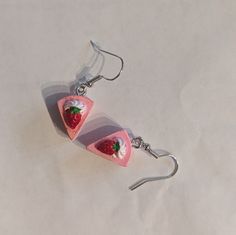 Little pink Strawberry Cake earrings, yummy to look at and fun to wear.  Additional color and detail has been hand painted onto them! Drop lengths:  3.5cm- earring hook is attached directly to strawberry cake charm 4cm- earring hook is attached to two 5mm jump rings and the charm 4.5cm- earring hook is attached to four 5mm jump rings and the charm Pink Polymer Clay Birthday Earrings, Sweet Pink Nickel-free Earrings, Nickel-free Sweet Pink Earrings, Pink Polymer Clay Earrings For Birthday, Sweet Pink Polymer Clay Jewelry, Pink Strawberry Print Earrings For Gift, Pink Strawberry Print Earrings As Gift, Pink Strawberry Cake, Cake Earrings