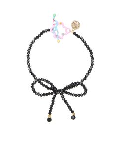 Inspired by the grace and delicacy of prima ballerinas, shimmering crystal beads loop de loop into a perfect, plucky bow. The best way to make your outfit en pointe! This crystalline bracelet wraps your wrists in a sweet bow, adding the perfect touch of grace to any look. Glass beaded chain. Available in Ballet Slipper, Ice, and Onyx! Available sizes: 6.5" / 7.5" All jewelry is made by hand to order. Jewelry will ship 2-3 weeks from the order date (if not sooner!) For custom chain length, please Elegant Beaded Bracelets For Party, Adjustable Party Jewelry With Decorative Bow, Adjustable Bow Jewelry For Evening, Party Crystal Bracelet With Black Beads, Black Beads Crystal Bracelet For Party, Adjustable Beaded Evening Bracelets, Chic Black Jewelry With Bow, Party Beaded Bracelets With Black Beads, Black Jewelry With Decorative Bow For Party