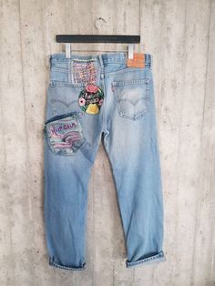 "Ready to send:Size-32,33,34,36,38 unique vintage jeans One of a kind.. Hand made embroidery and unique patches. ---Or---- Made to order, in any size, withim 14 working days . If you need different size, please send me a message and I will make you a special and unique design within 14 working days. They are all different! No one will have the same one as you have! Hand painted, one of kind jeans. You pick your size, model (slim- boyfriend- high waist- low waist) and primer color and you will ge Festival Straight Leg Denim Jeans, High Rise Denim Jeans For Festivals, Mid-rise Denim Jeans For Festival, Vintage Denim Bottoms For Festival, Festival Straight Leg Jeans With Pockets, Casual Reworked Jeans For Festival, Festival Straight Leg Jeans, Upcycled Medium Wash Straight Leg Jeans, Upcycled Straight Leg Medium Wash Jeans