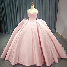 Pink Strapless Satin Quinceanera Dress Strapless Princess Ball Gown For Prom, Strapless Quinceanera Dress For Debutante Ball, Quinceanera Ball Gown Evening Dress With Corset Back, Princess Ball Gown With Corset Back For Debutante Ball, Quinceanera Dress For Prom Season With Corset Back, Quinceanera Gown With Boned Bodice Ball Gown, Princess Style Quinceanera Dress For Prom, Princess Style Prom Ball Gown With Sweetheart Neckline, Princess Ball Gown With Sweetheart Neckline For Prom