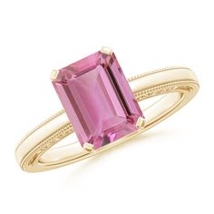 Chic and sophisticated, this solitaire ring showcases an emerald-cut pink tourmaline in a prong setting. The filigree cutwork in the front and the intricate milgrain along the edges add fine details to this splendid 14k yellow gold ring. Pink Tourmaline Ring, 14k Rose Gold Ring, 18k Yellow Gold Ring, Solid Gold Rings, Tourmaline Ring, Pink Ring, Three Stone Rings, Pink Tourmaline, Yellow Gold Rings