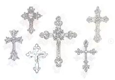 four different types of crosses are shown in this drawing technique, and each has an intricate design on the cross