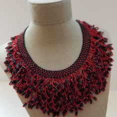 Beautiful Red Necklace %100 Handmade By Me. A Beautiful Red Necklace.Made Of Seed Bead In Red And Black. %100 Handmade By Me. Please Contact Me If You Have Any Questions. Thank You For Looking And Have A Great Day! Elegant Red Beaded Necklace With Black Beads, Elegant Red And Black Beaded Necklaces, Elegant Red And Black Beaded Necklace, Party Red Beaded Necklaces With Black Beads, Red Necklace With Black Beads For Party, Handmade Red Beads For Party, Red Necklace, Have A Great Day, Lady In Red