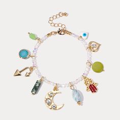 Capture the essence of summer with this unique Evil Eye Colorful Beaded Bracelet! Featuring a combination of multi-colored elements and a shining evil-eye, it is perfect for those who believe in the power of good luck. Adorable and pastel, this bracelet is a must-have for warding off misfortune and bringing a touch of the sea to your style. DETAILS Plating: 18K Gold Materials: 18K Gold on Brass, Natural Stones, Glass Beads Measurements: Length: 7.48"(19cm) + Extender: 1.96"(5cm) Weight: 15g Bohemian Multicolor Metal Charm Bracelet, Bohemian Style Multicolor Metal Charm Bracelet, Spiritual Crystal Bracelet With Colorful Beads For Festivals, Symbolic Multicolor Beaded Jewelry, Multicolor Beaded Metal Charm Bracelet, Bohemian Charm Bracelets For Festivals, Bohemian Multicolor Charm Bracelet For Beach, Symbolic Multicolor Festival Jewelry, Multicolor Bohemian Evil Eye Bracelet For Festivals