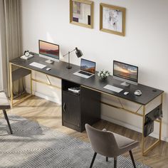 a desk with two laptops on it in front of a window and a chair