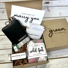 the grooms gift box is filled with personal items