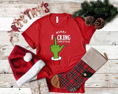 Grinch Christmas Shirt, Merry F*cking Christmas Shirt, Retro Grinchmas Shirt, Merry Grinch Shirt, Christmas Sarcasm Shirt,Gift For Her Shirt  PREMIUM T-SHIRT FEATURES ✔️ Short Sleeve, Crew Neck, Super Soft Bella Canvas T-Shirt ✔️ 100% Combed and Ring-Spun Cotton (Heather Colors Contain Polyester) ✔️ Shoulder-to-Shoulder Taping ✔️ Side-seamed ✔️ Safe to Machine Wash and Tumble Dry on Low ✔️ Design is High Quality Permanently Printed ✔️ Made, Printed and Shipped from The USA Grinch Christmas Shirt Teepublic, Grinch Christmas Shirts United Monograms, Grinch Christmas Shirts Teepublic, Funny Christmas Shirts Grinch Family, Grinch Saying Tshirt, Grinch Christmas Shirts Funny, Grinch Vs Santa T Shirts, Funny Christmas Shirts Grinch, Disney Christmas Grinch Shirts