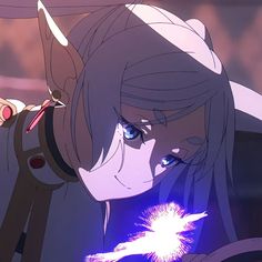 an anime character with long hair and blue eyes holding a sparkler in her hand