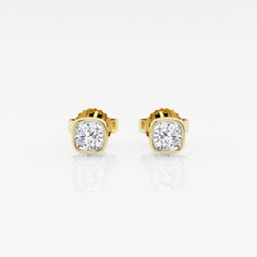 Get cozy with these cushion shaped diamonds wrapped around with a beautiful bezel. Lab grown diamond stud earrings that make a perfect gift for that perfect someone. Cushion Cut Diamond Luxury Earrings, Elegant Cushion Cut Yellow Gold Earrings, Luxury Single Diamond Earrings For Anniversary, Luxury Diamond Earrings With Cushion Cut And Accents, Cushion Cut Cubic Zirconia Diamond Earrings For Anniversary, Cubic Zirconia Cushion Cut Diamond Earrings For Anniversary, Timeless Diamond Earrings With Bezel Setting As Gift, Cushion Cut Diamond Earrings For Anniversary, Elegant Cushion Cut Diamond Earrings With Brilliant Finish