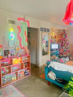 a living room filled with furniture and a christmas tree