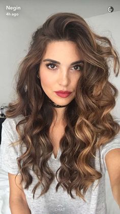 #Farbbberatung #Stilberatung #Farbenreich mit www.farben-reich.com Whoever says perfect hair doesn’t exist hasn’t seen Negin Mirsalehi’s Snapchat account. It's almost as if her gorgeous brown hair could have an account of its own. With over a million followers on Instagram, it is hard not to migrate over and catch a glimpse of her fancy excursions in the Hamptons, cuddle time with her boyfriend, and again, that hair! Long Brown Hair, Hair Crush, Long Curly Hair, Long Curly, Hair Dos, Gorgeous Hair, Perfect Hair, Pretty Hairstyles, Wavy Hair