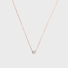 Our baguette bezel pendant is the perfect every day piece to wear on its own or layered! G-H color, VS clarity, 0.15ctw Adjustable chain length Timeless Baguette Cut Single Diamond Necklace, Rose Gold Baguette Cut Fine Jewelry Necklace, Timeless Single Diamond Baguette Cut Necklace, Timeless Rose Gold Jewelry With Baguette Diamonds, Rose Gold Necklaces With Baguette Diamonds, Everyday Rose Gold Necklace With Single Cut Diamonds, Everyday Rose Gold Jewelry With Baguette Diamonds, Classic Everyday Baguette Cut Necklace, Bezel Necklace