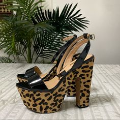 Never Worn, Wild Pair Cheetah With Black Patent Leather. So Fun, They Would Look Awesome With Black Flair Jeans And A Blazer! They’re Also Very Comfortable! Let Me Know If You Would Like Photos Of Them On Chic High Heel Sandals In Leopard Print, Chic Leopard Print Sandals For Party, Leopard Print Sandals With Round Toe For Party, Chic Leopard Print Heels With Round Toe, Casual Leopard Print High Heels, Chic Leopard Print High Heel Sandals, Chic High Heel Leopard Print Sandals, Chic Leopard Print Heels With Heel Strap, Chic Leopard Print Heels With Medium Width