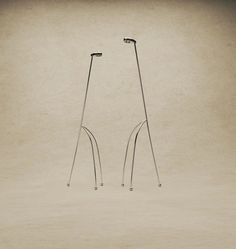 two metal poles standing next to each other