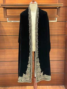 Experience luxury with our Black Pure Shaffon Velvet Shawl, a work of art appropriate for both bride and groom. The finest materials in an elegant antique colour scheme are showcased in the magnificent hand-stitched zardozi work surrounding the edges of the velvet. This shawl is more than simply an accessory--it's a classic work of art due to the flawless craftsmanship. The velvet that is used is rare to be found because of its purity. Our goal at Elaf Prestige is to give consumers products that Shawl Pakistani, Velvet Shawl Wedding, Black Velvet Shawl, Shawl For Men, Vampire Au, Zardozi Work, Velvet Shawl, Black Pure, Indian Brides