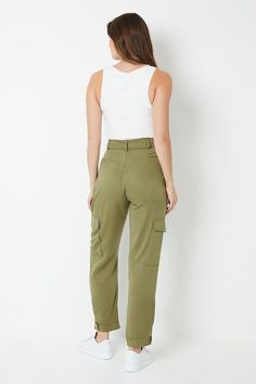 Relaxed, utilitarian-inspired woven trousers with a belted paperbag waist
Functional cargo pockets add a practical touch
Tapered leg silhouette for a flattering fit
Adjustable D-ring belt allows for a customisable fit
Versatile design suitable for casual and smart-casual occasions
Exude effortless sophistication with these woven utility trousers from Wallis. The relaxed fit and tapered leg create a flattering silhouette, while the belted paperbag waist adds a touch of structure. Pair them with a crisp blouse and loafers for a polished daytime look, or dress them down with a tee and trainers for a casual weekend ensemble. The functional cargo pockets provide a utilitarian edge, making these trousers a versatile choice for everything from brunch dates to gallery visits. Utility Trousers, Occasion Dresses Wedding Guest, Brunch Dates, Ring Belt, Petite Jumpsuit, Petite Coat, Tall Clothing, Casual Weekend, Cold Weather Outfits