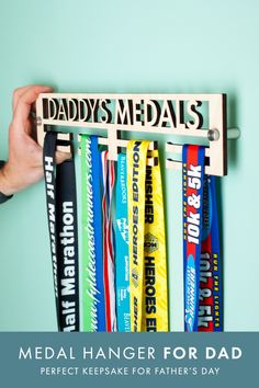 the medal hanger for dad's day is made out of wood