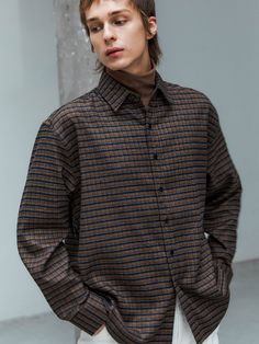 Editor's NotesThis oversized check shirt is made from warm and soft wool-blend in tartan check with classic color combination. It has relaxed silhouette with comfortable fit so works well all year round.- Collared neck- Button fastening- Drop shoulder- Hi-low hem- Oversized fit- Unisex wearMeasurements (in.)Size: S / M / L- Total Length: 29.1 in. / 29.5 in. / 30.3 in.- Shoulder: 19.3 in. / 20.1 in. / 20.9 in.- Chest: 23.6 in. / 24.8 in. / 25.6 in.- Sleeve Length: 24.0 in. / 24.4 in. / 24.8 in.*M Plaid Wool Tops For Winter, Plaid Wool Top For Fall, Plaid Wool Shirt For Fall, Fall Houndstooth Shirt For Workwear, Houndstooth Shirt For Workwear In Fall, Business Casual Plaid Flannel Shirt For Fall, Casual Long Sleeve Flannel Shirt For Business, Plaid Shirt For Workwear In Fall, Brown Relaxed Fit Flannel Shirt For Winter