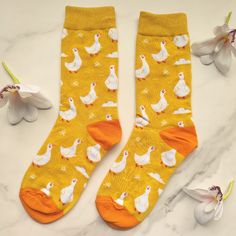 Disclaimer: All Photos Are Taken By Goob's Closet & Boutique. We Sell On Multiple Platforms. If You Choose To Wait To Purchase This Item, It May Sell Out On Another Platform First, And Will Then Be Removed From Poshmark Without Notice To You. New Boutique Item These Vibrant Yellow Socks Feature A Playful Pattern Of White Ducks And Small White Clouds, All Set Against A Bright Background, With Contrasting Orange Toes And Heels. Crafted From Soft, High-Quality Fabric, They Promise Exceptional Comfo Orange Toes, Amber Christmas, Duck Socks, Ig Outfits, Fruit Socks, Yellow Socks, Unique Socks, Funky Socks, Fun Socks