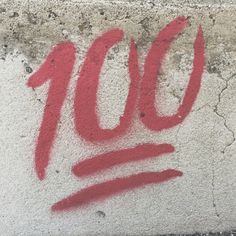 graffiti written on the side of a cement wall that reads 10 o'clock in red