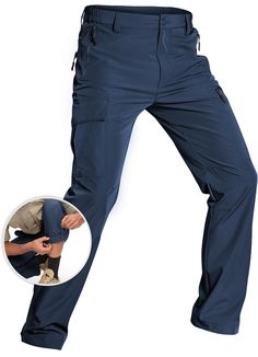 an image of a man in blue pants with his hands on his hips and the bottom half