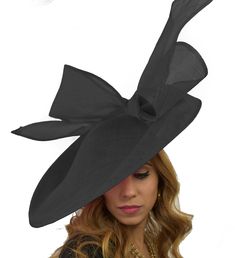 2015 Hats By Cressida British Birds Collection Barn Owl Fascinator Hat Gorgeous extra large sinamay flat hat trimmed with a modern take on a bow. Measures 48cm wide or about 19 inches We can make this in many different colours. If you prefer the bow to be a different colour to the base just state this when you pay. On a headband. Headband Colour: We always try and match the band to the fascinator. If we cant do this the band colour will be Black. If you dont wish a black band please supply an al Fitted Top Hat For Races At Royal Ascot, Black Boater Hat With Flat Brim For Party, Black Boater Hat For Races, Black Flat Brim Top Hat For Party, Black Party Costume Hat With Flat Brim, Fitted Black Boater Hat For Races, Fitted Mini Hats With Flat Brim For Races, Fitted Cloche Costume Hat For Races, Black Boater Hat For Royal Ascot Party